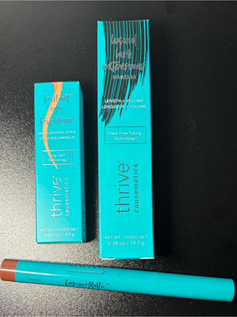 THRIVE CAUSEMETICS mascara, mini eye brightener, matte lipstick